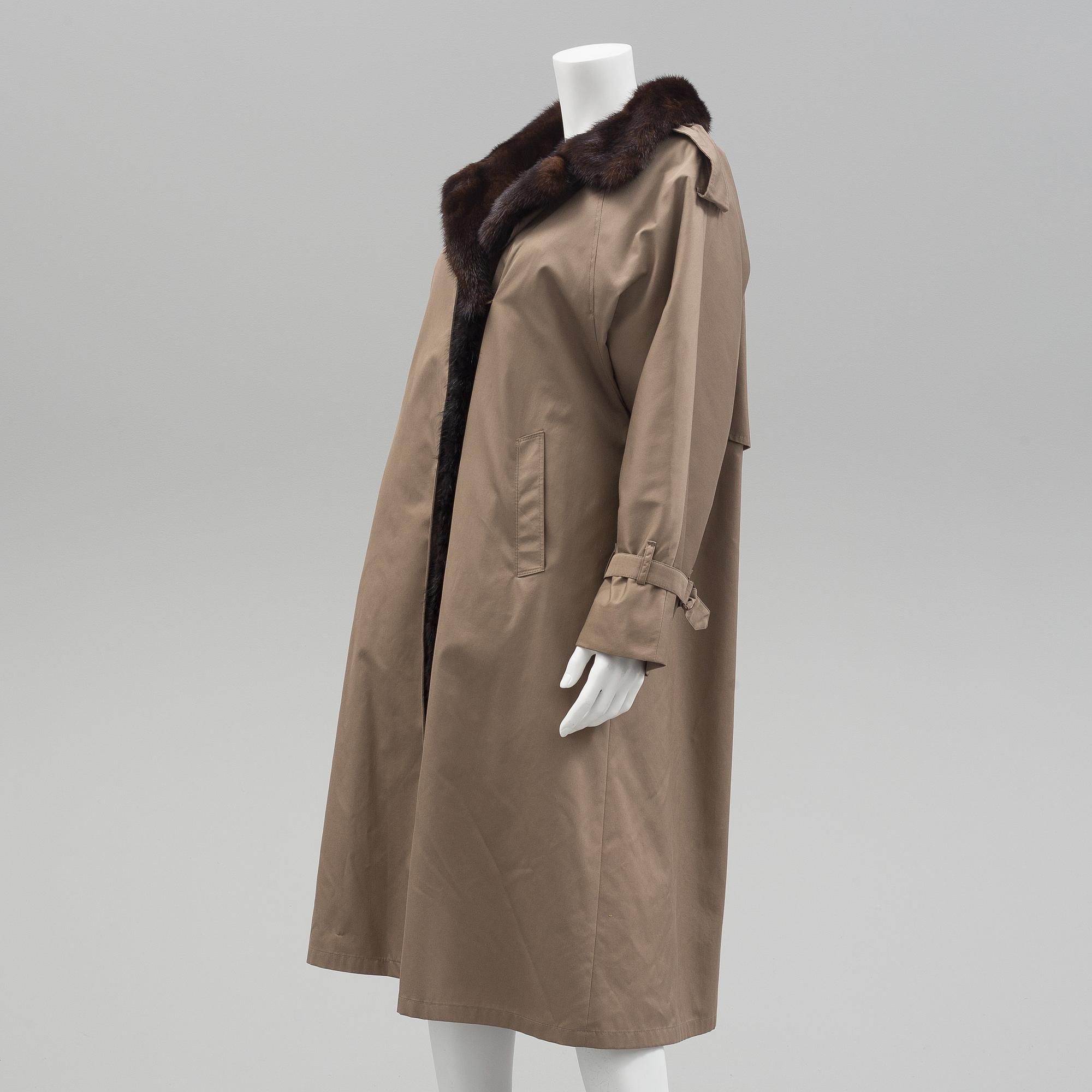 A mink fur lined trench coat from Saga Mink Furscandia size 36. Bukowskis