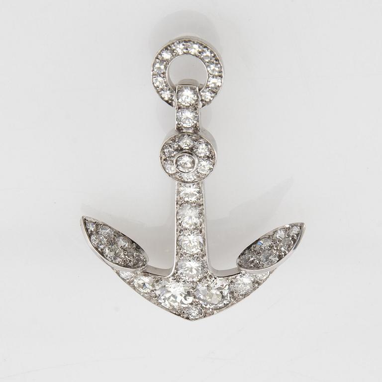Brosch i form av ett ankare av 18K vitguld med diamanter.