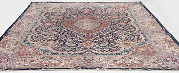 A Kashmar carpet, c. 390 x 289 cm.