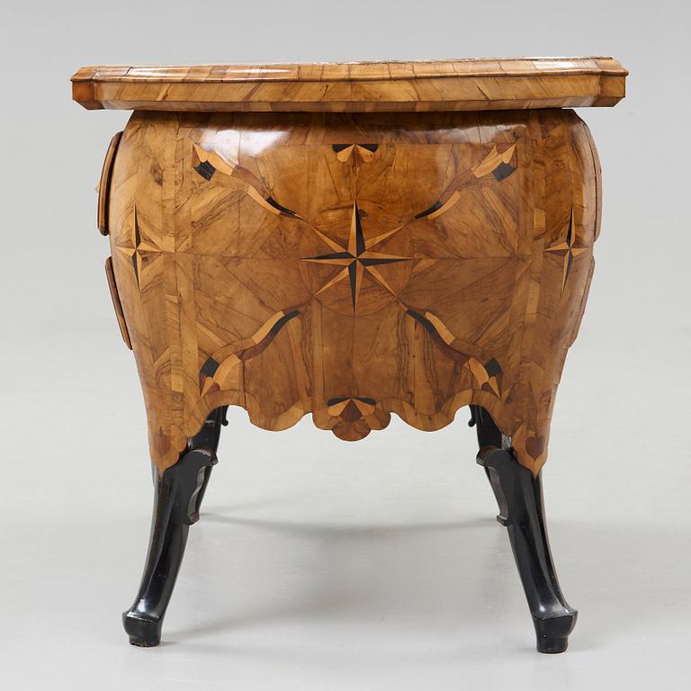 A Rococo mid 18th century commode, probably German.