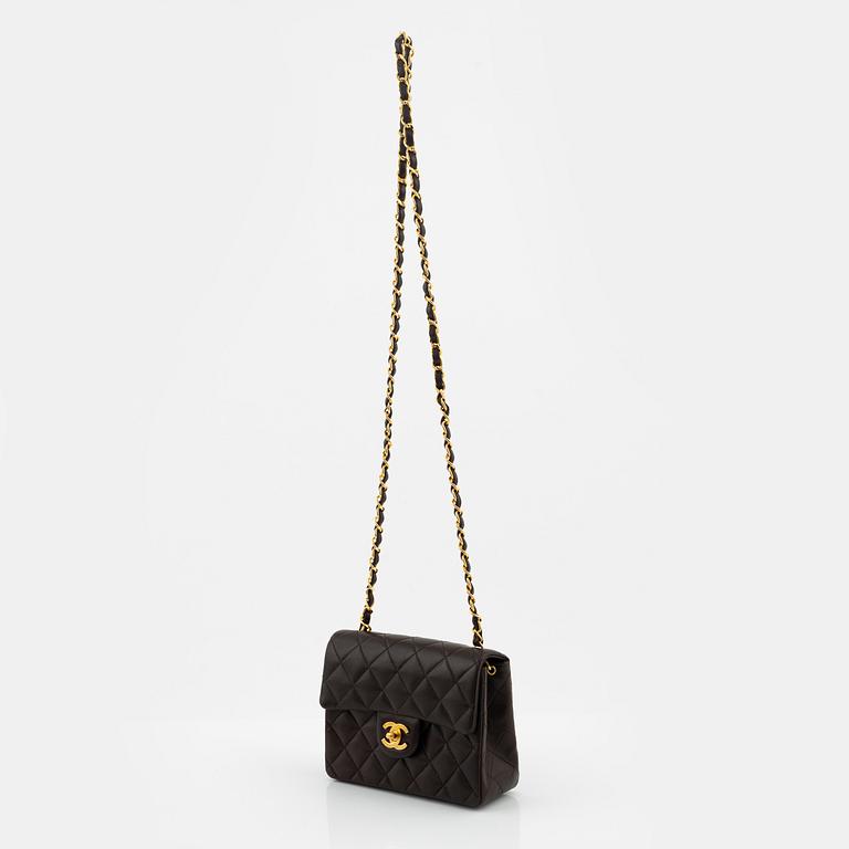 Chanel, A brown leather 'Mini Flap' bag, 1996-1997.