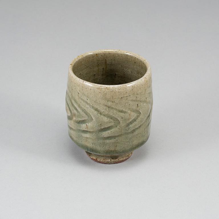 TATSUZŌ SHIMAOKA, a celadon glaze vase, signed.
