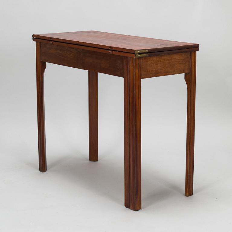 An 19th century game table England.