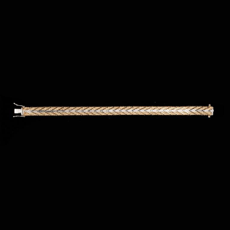 ARMBAND, 18k guld, tvåfärgat. Vikt 31,9g.