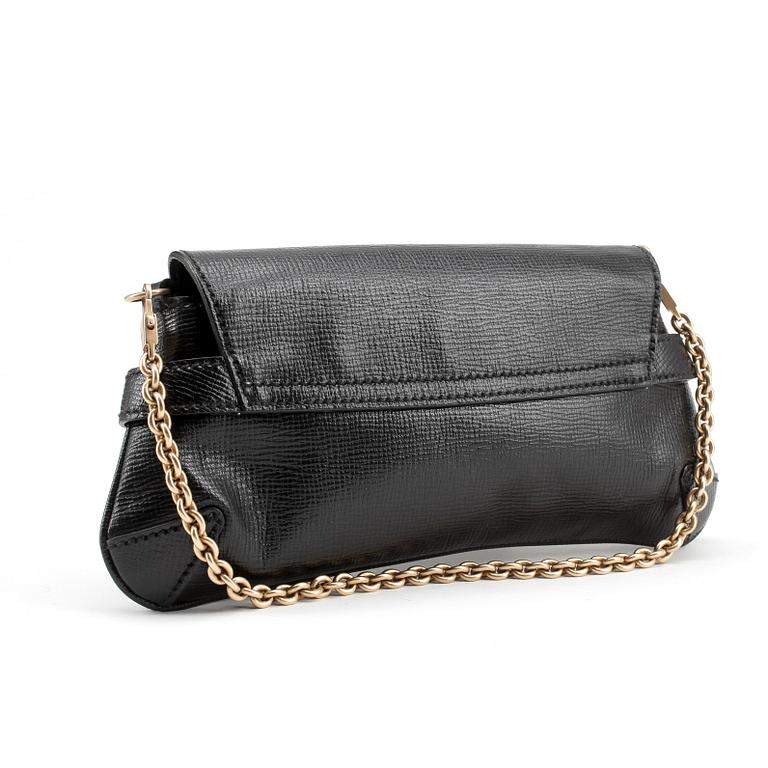 GUCCI, a black embossed leather clutch with a shoulder strap.