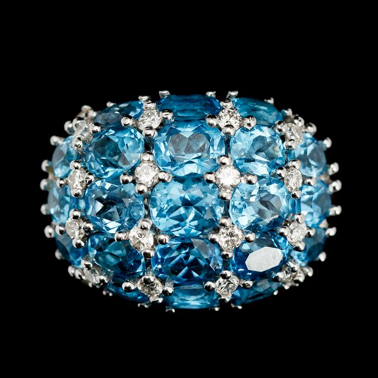 RING, 18 k vitguld, briljantslipade diamanter tot ca 0.80 ct samt 21 turkosa topaser.