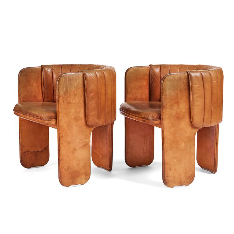 Luigi Massoni, a pair of easy chairs, Poltrona Frau, Italy 1970's.