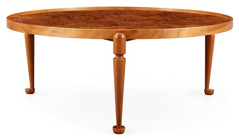 A Josef Frank walnut and burrwood sofa table by Svenskt Tenn, model 2139.