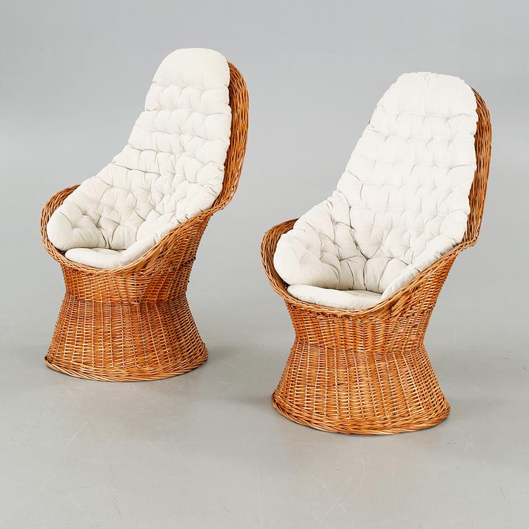 A pair of chairs and one table from the latter half of the 20th century.