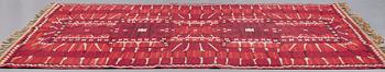 Barbro Nilsson, A CARPET, "Strålblomman, röd", flat weave, ca 313,5 x 200-202,5 cm, signed AB MMF BN.