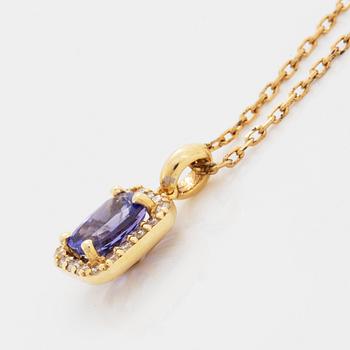 An 18K gold necklace set with a faceted tanzanite.
