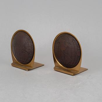 A pair of brass book ends, mid 20th century.