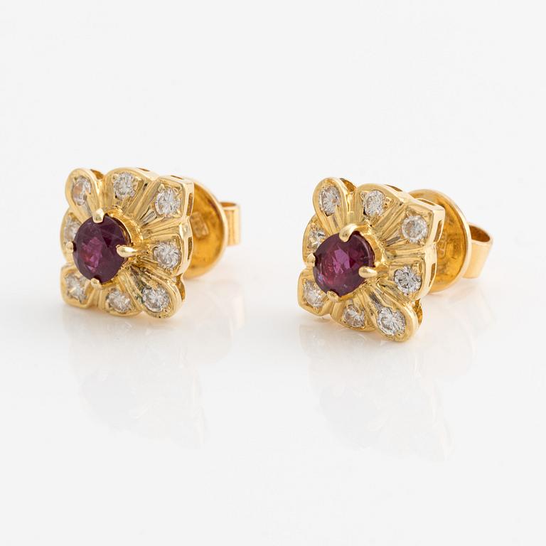 Earrings, gold, with rubies and brilliant-cut diamonds.