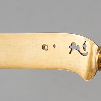 A SILVER GILT LETTER OPENER, circa year 1900.