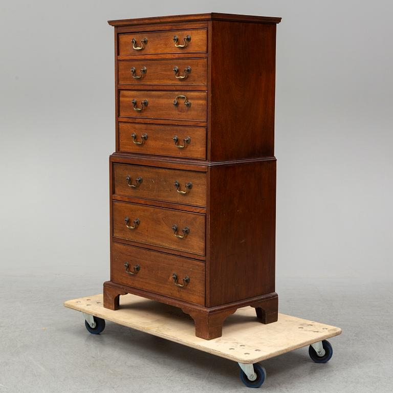 A mahogany 'Tallboy' chest of drawers.
