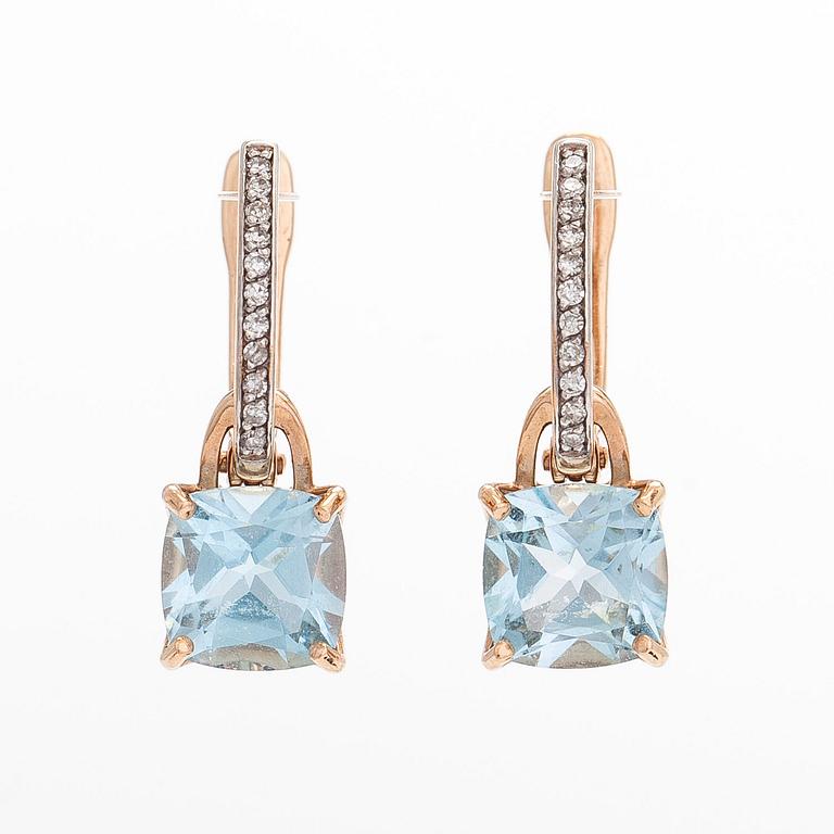 A pair of 14K rosegold earrings, with diamonds and topazes. Soviet Union.