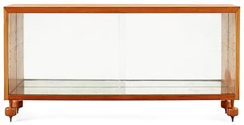 A Josef Frank walnut showcase cabinet by Svenskt Tenn,