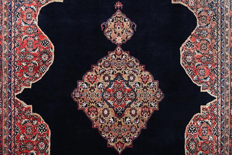 A Moud carpet, c. 310 x 206 cm.