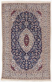 A Nain carpet, c. 295 x 190 cm.