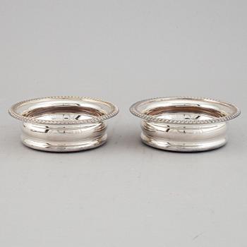 Coasters, two pairs, silver plate, England.