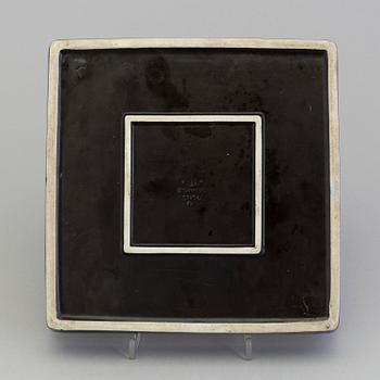 A stoneware plate by Stig Lindberg for Gustavsberg, model "Domino", 1955-69.