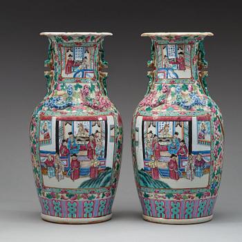 A pair of Canton famille rose vases, Qing dynasty, 19th Century.