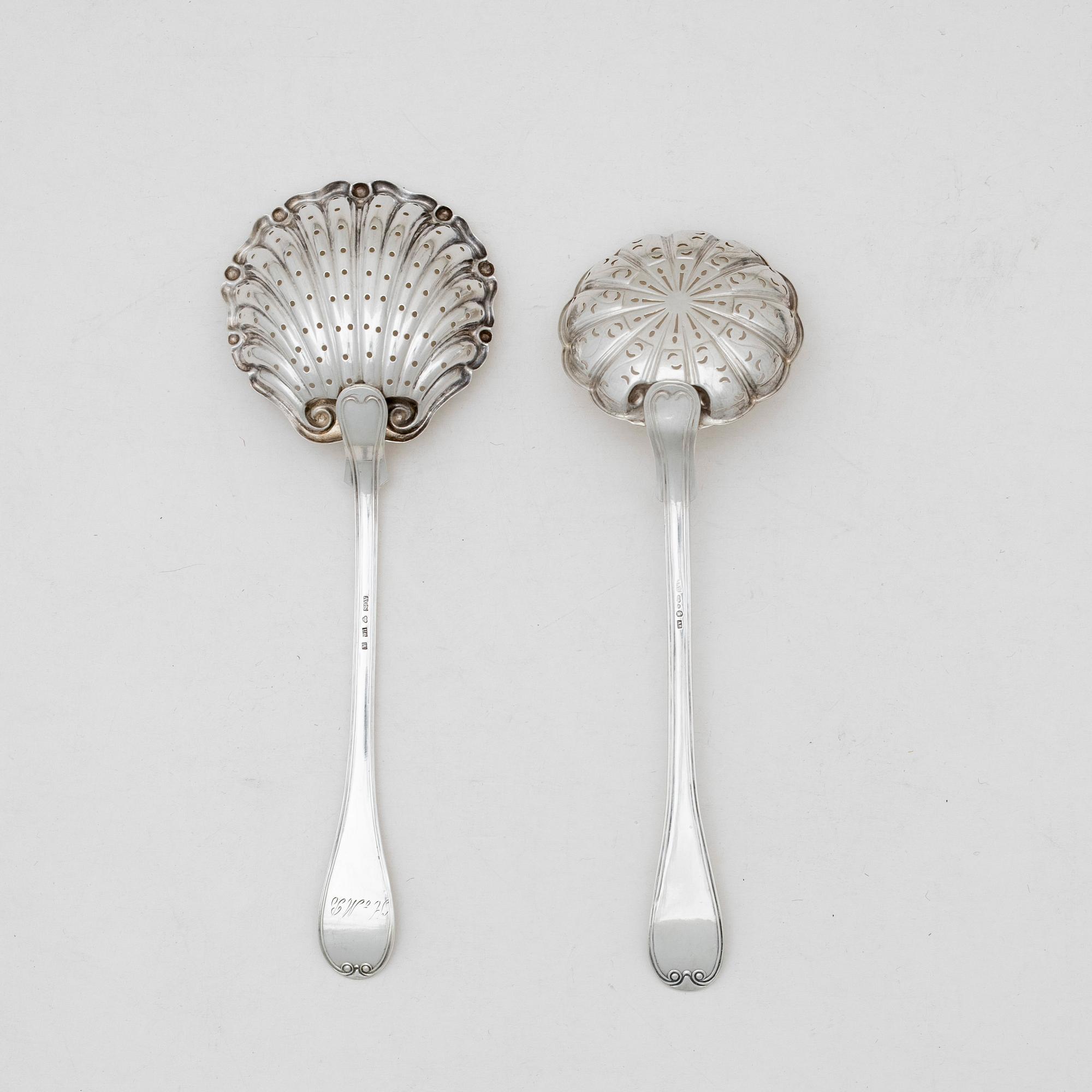Two Swedish silver tea strainers, mark of A.G. Sundberg, Västerås 1898 and J.A. Öberg, Hudiksvall 1927.