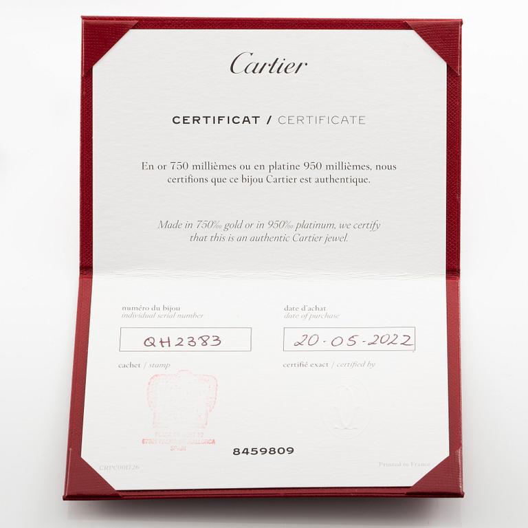 A Cartier ring in platinum with a round brilliant-cut diamond 0.91 ct according to the engraving.