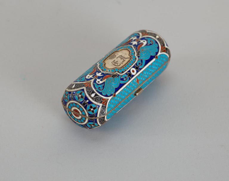 A Russian 19th century silver-gilt and enamel cigarette-case, makers mark of Ivan Chlebnikov, Moscow.
