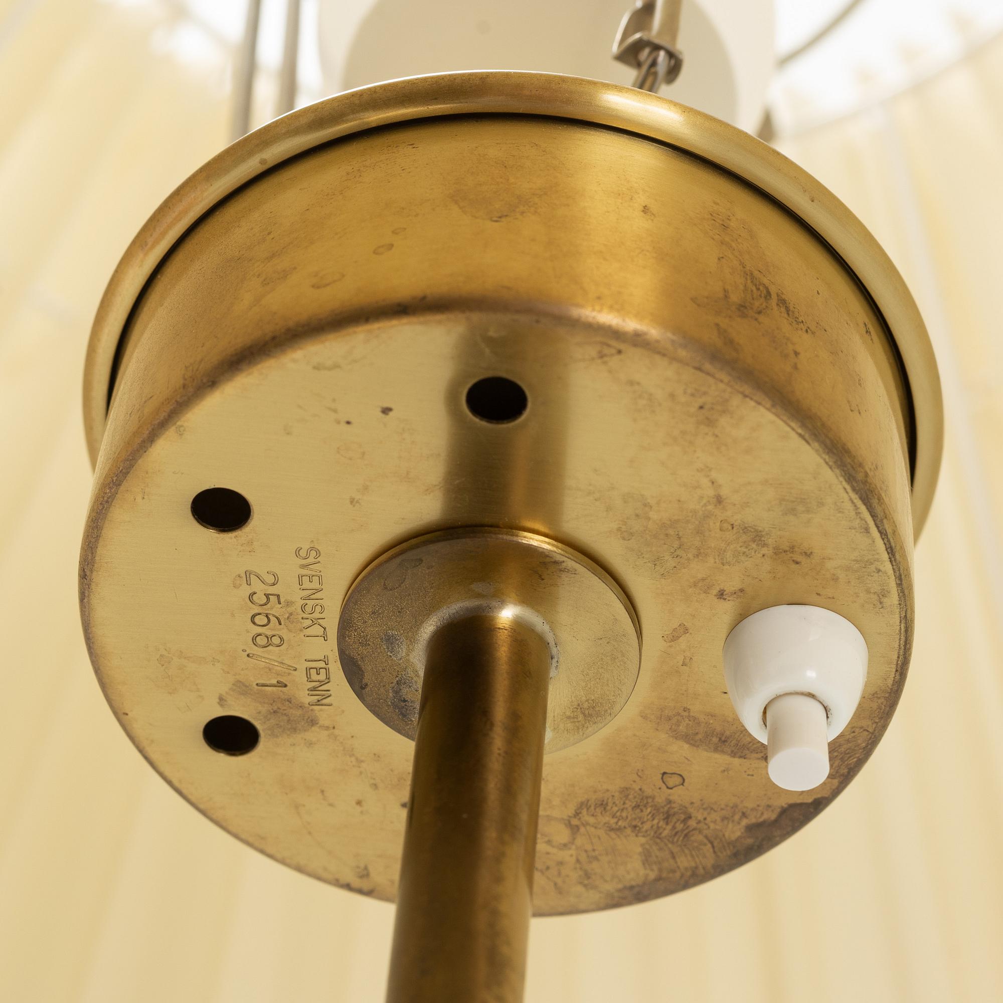 Josef Frank, a model '3568' brass floor lamp, Firma Svenskt Tenn.
