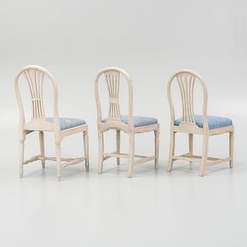An assembled suite of eleven Gustavian and Gustavian-style chairs, late 18th century — late 20th century.