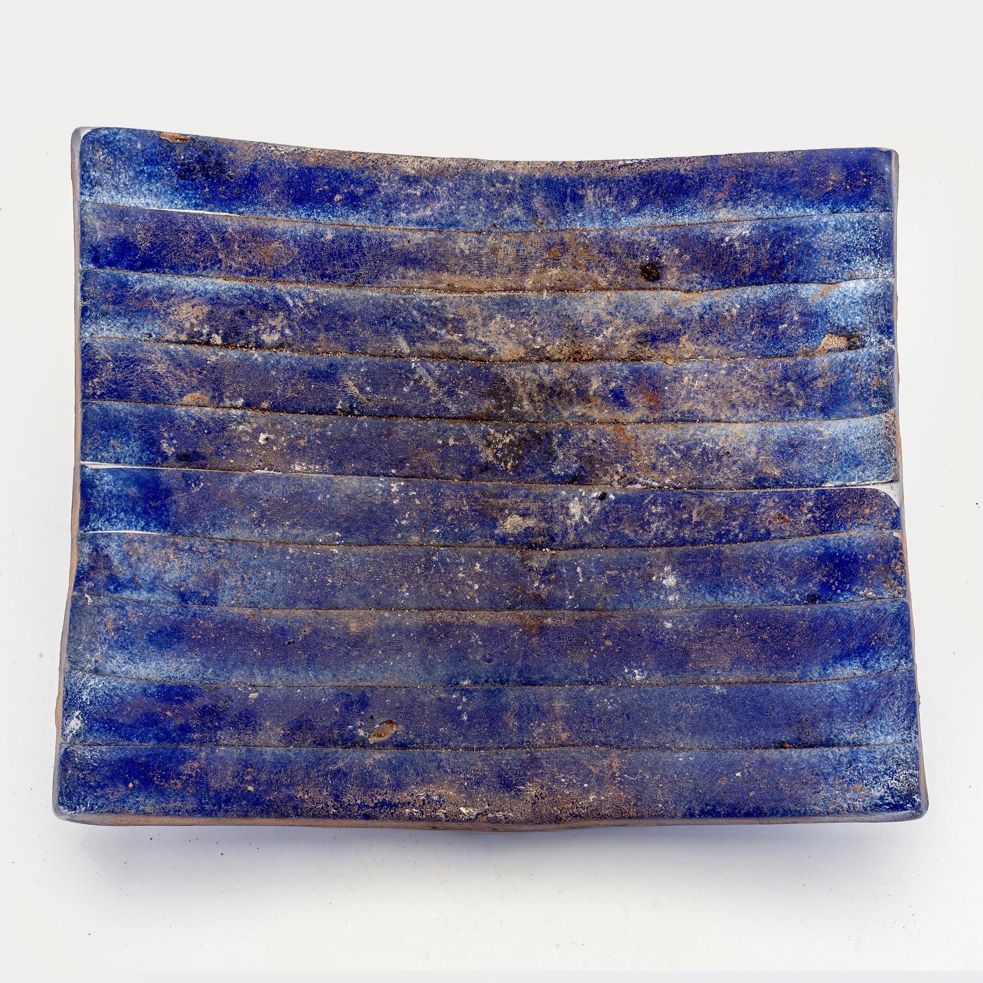 A Paula Barton signed and dated glass plate.