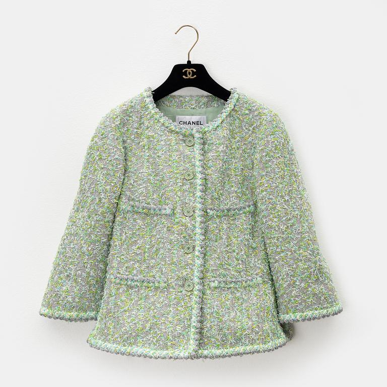 Chanel, a green and silver bouclé jacket, 2018, French size 34.