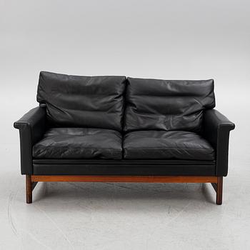 Two leather upholstered sofas and an armchair, IKEA, Sweden, 1960's/70's.