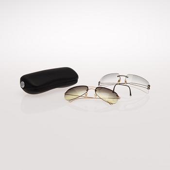 TWO PAIRS OF SUNGLASSES BY Chanel and Gucci.