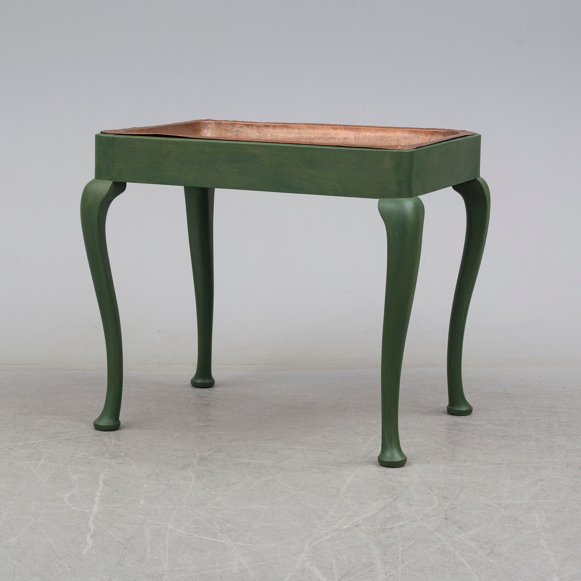 An early 20th century table by AB Nordiska Kompaniet.