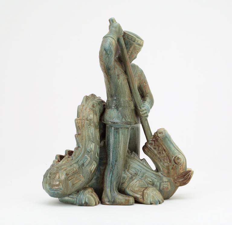 A Gunnar Nylund stoneware sculpture of S:t Michael and the dragon, Rörstrand.