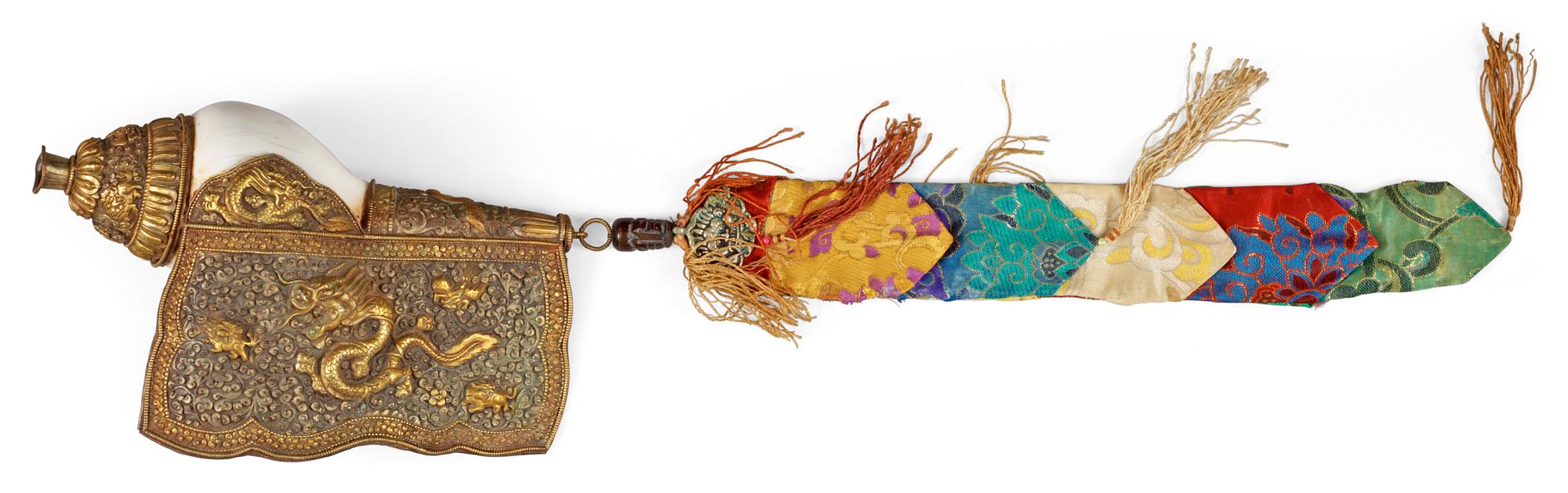 A elaborately decorated ritual Tibetan Conch-shell horn, Qing dynasty, 19th Century.