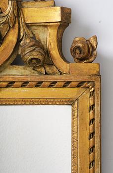 A Gustavian giltwood mirror by C. G. Fyrwald (master in Stockholm 1776-1825).