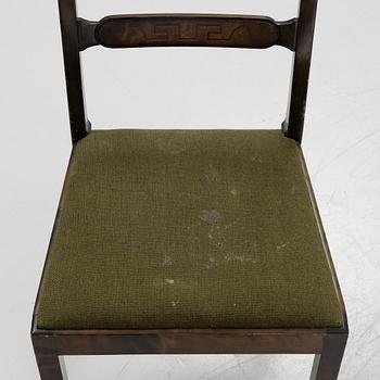 A Swedish Grace birch dining table and four chairs, 1920's/1930's.