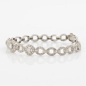 Bracelet in platinum set with round brilliant, octagonal, and rose-cut diamonds.