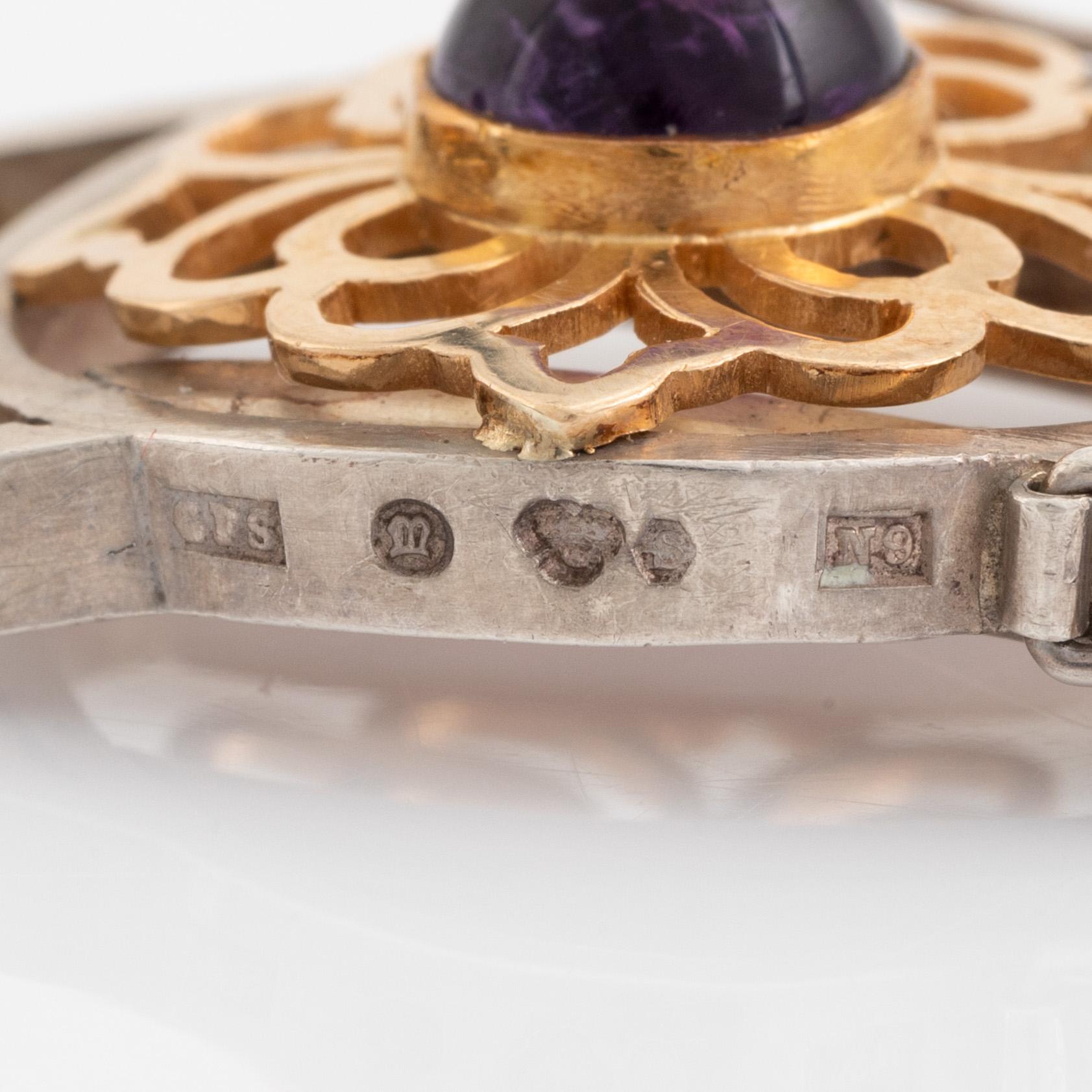 Silver and 18K gold with cabochon cut amethyst necklace.