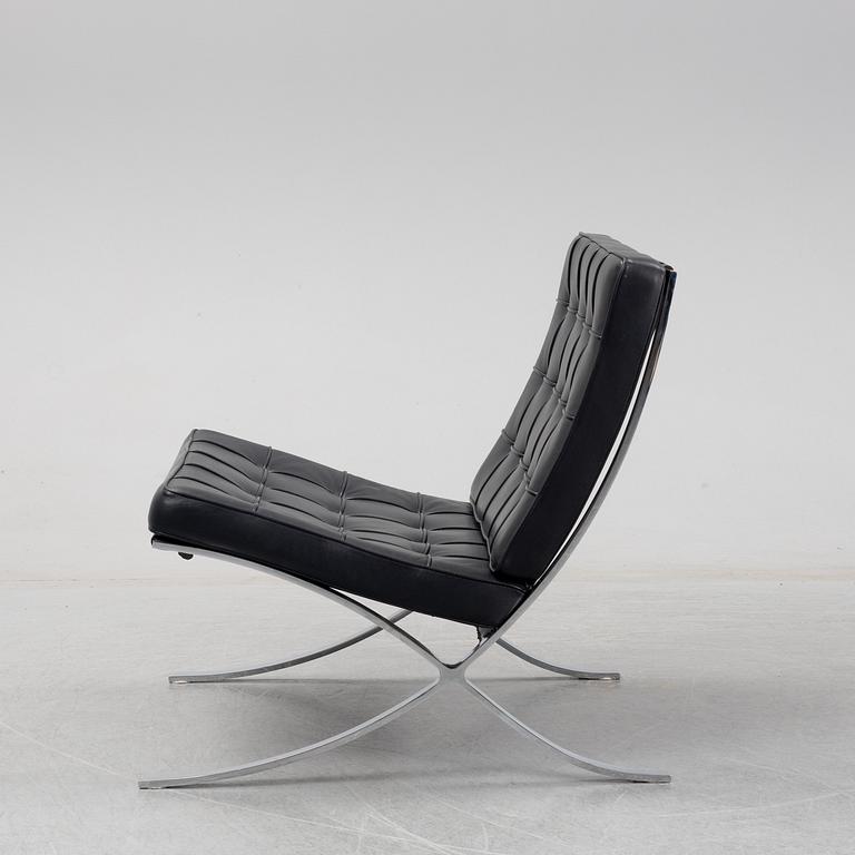 LUDWIG MIES VAN DER ROHE, a 'Barcelona' black leather lounge chair, Knoll Studio.
