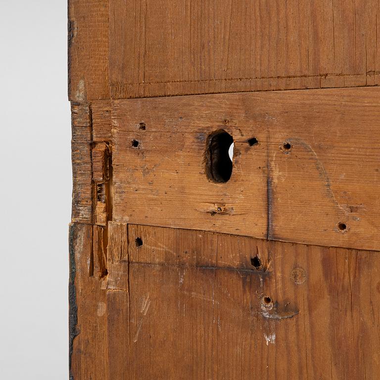 A corner hanging cabinet, dated 1844.