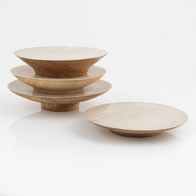 Magnus Ek, a set of four ash wood serving plates for Oaxen Krog, 2020.