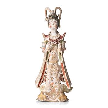 A elegant pottery figure of a court lady, Tang dynasty (618-907).