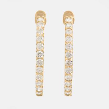 Brilliant cut diamond hoop earrings.