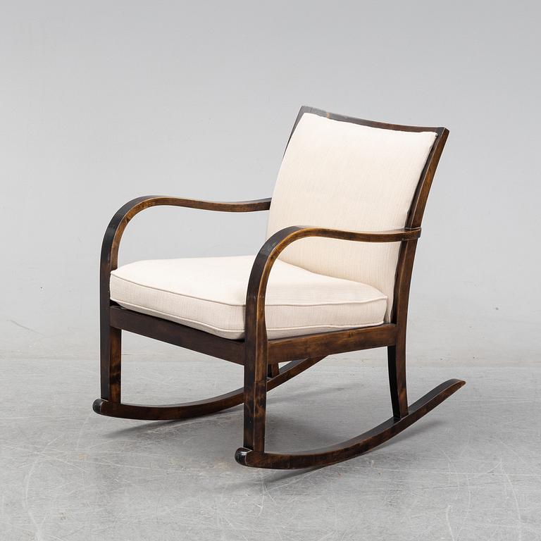 A 1930's stained birch rocking chair from Knolls Moderna Fåtöljer, 1930's.