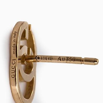 Gucci, a pair of 18K gold "GG Running" earrings.