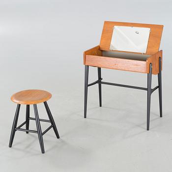A mid 20th century dressing table and stool.